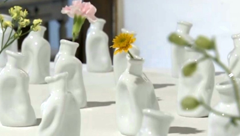 To introduce the deformed brown glass bottle from Nagasaki during the atomic explosion in 1945. Image by NHK.